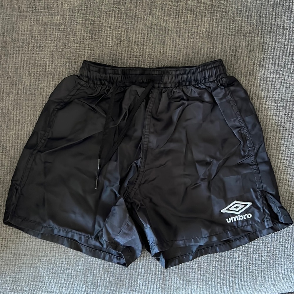 Boys black soccer shorts.